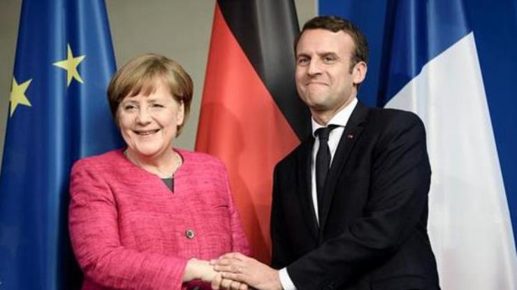 Канцлерка Німеччини Меркель і президент Франції Макрон привітали зміни в реалізації Мінських угод